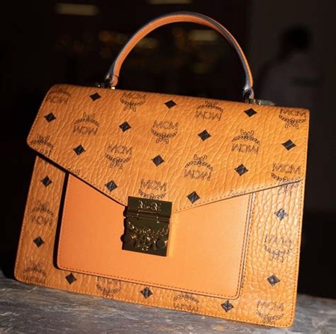 how can you tell if a mcm bag is fake|how to check for genuine mcm bags.